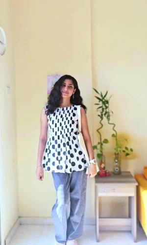 Women’s Black & White Polka Dot Sleeveless Peplum Top